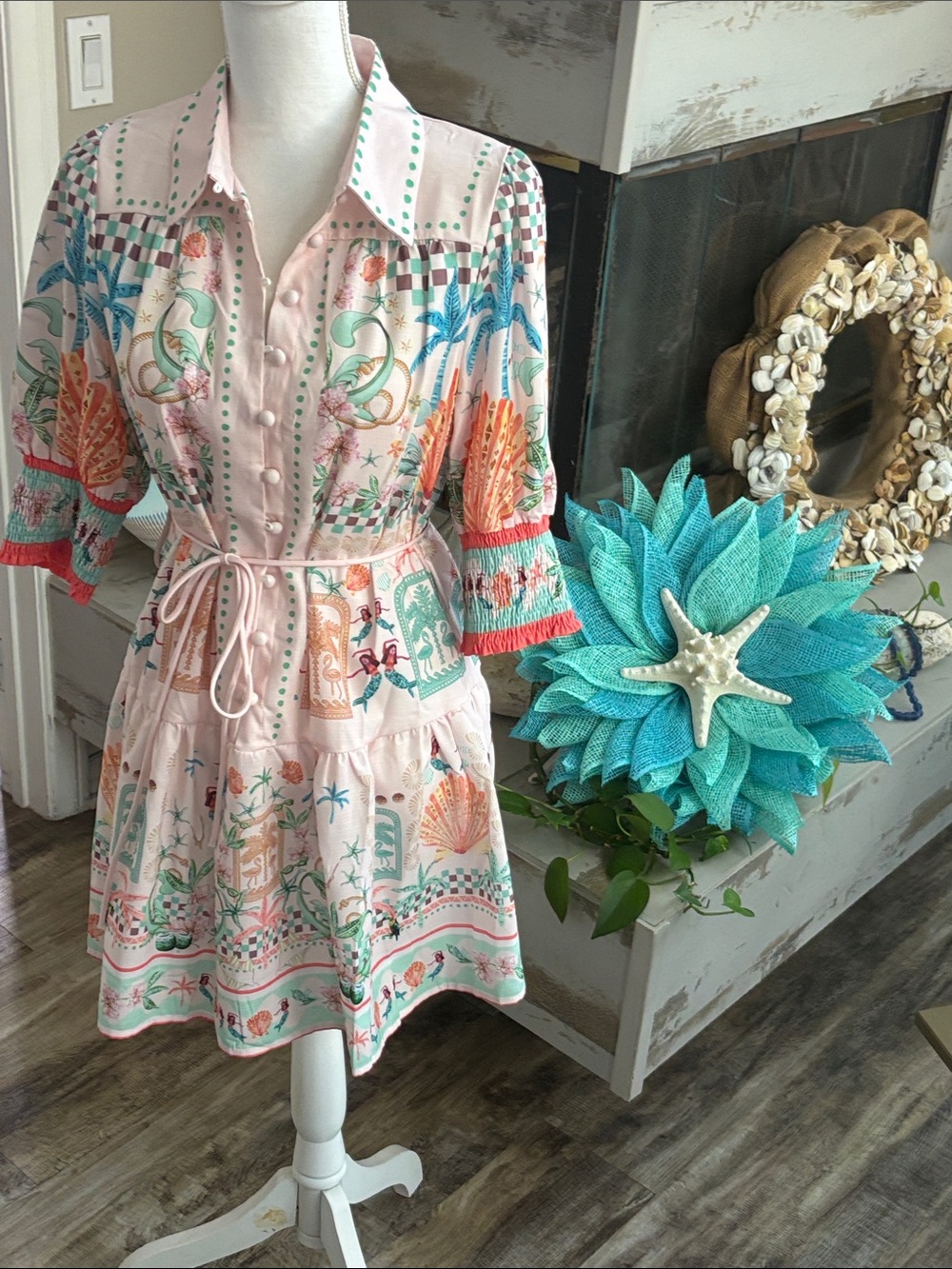 Cute coastal print mini dress. Can be worn belted or not